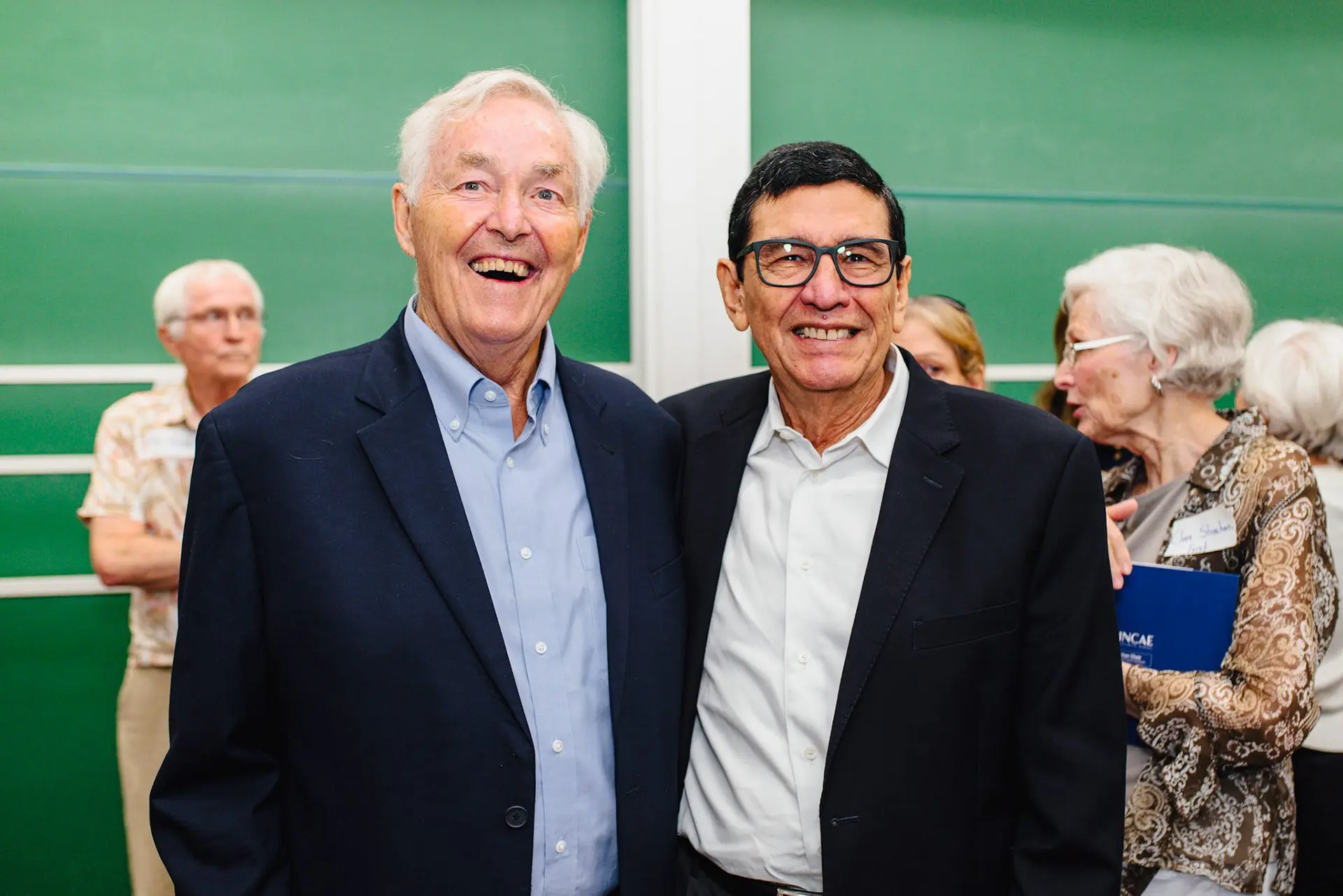 Executives talking during an INCAE event