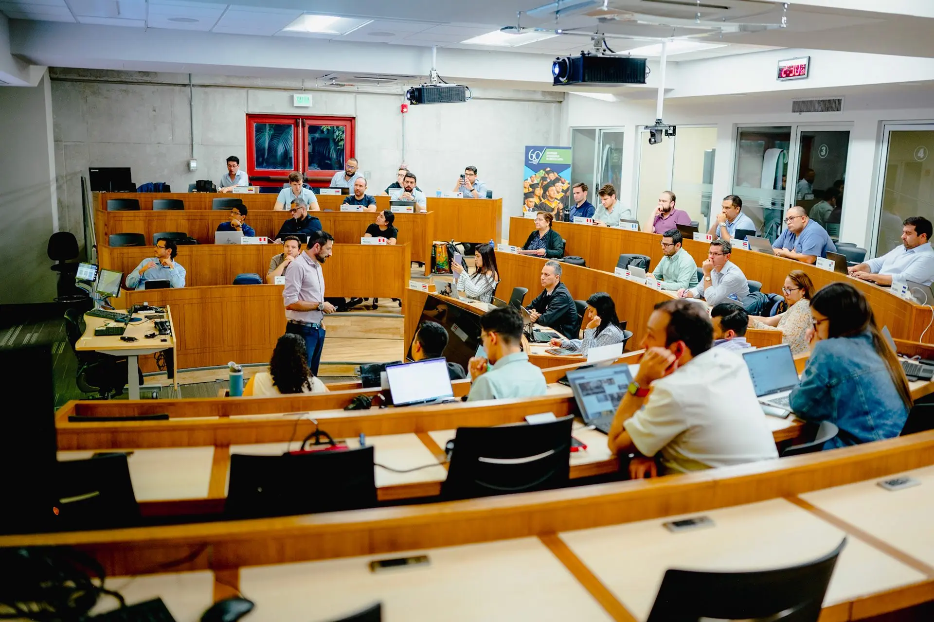 INCAE classroom with participants during a case